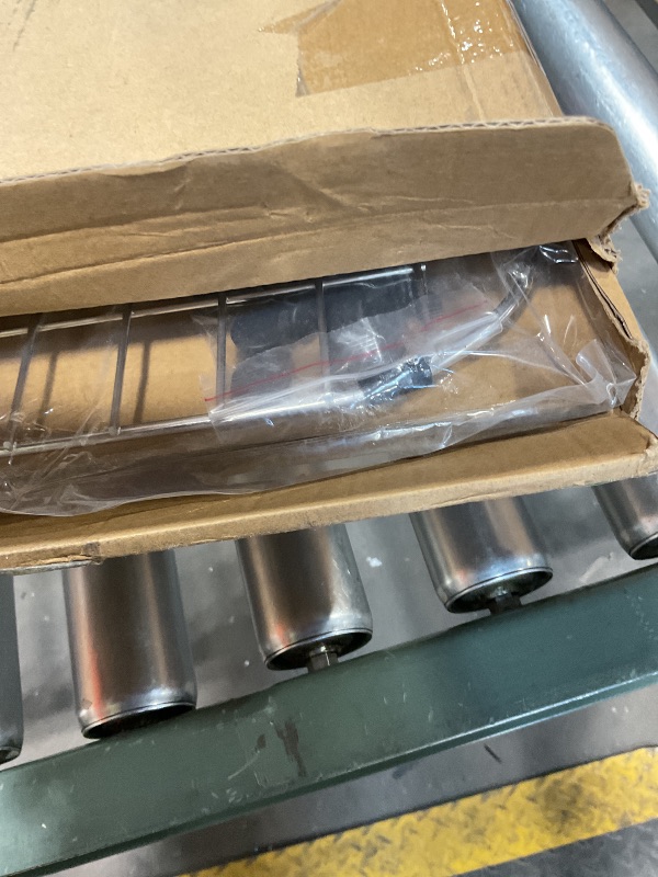 Photo 1 of ***DAMAGED (BENT)**** Serene Valley Sink Protector Grid 26-1/16" x 14-1/16", Centered Drain with Corner Radius 3-1/2", 304 Stainless Steel Material NLW2614C