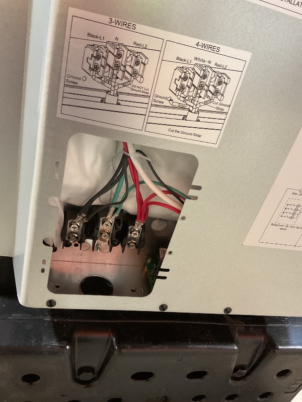 Photo 1 of **DIRT/SCRAPES FROM TRANSPORT **Avanti Electric Range Oven ELITE Series Compact Design, 2-Cu.Ft. Capacity with 4 Coil Burners, Framed Glass Oven Door, Storage Drawer and Broiler with Pan, 20-Inch, Stainless Steel