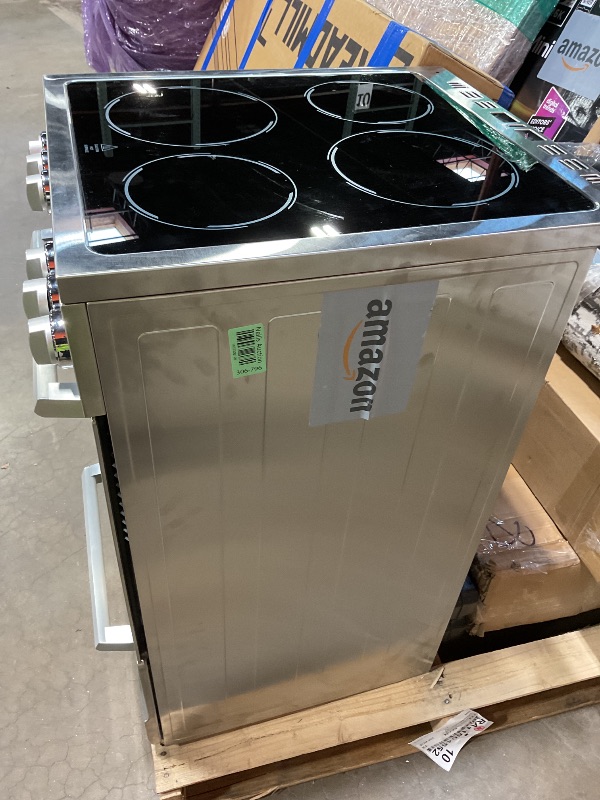 Photo 1 of **DIRT/SCRAPES FROM TRANSPORT **Avanti Electric Range Oven ELITE Series Compact Design, 2-Cu.Ft. Capacity with 4 Coil Burners, Framed Glass Oven Door, Storage Drawer and Broiler with Pan, 20-Inch, Stainless Steel