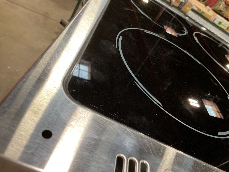 Photo 1 of **DIRT/SCRAPES FROM TRANSPORT **Avanti Electric Range Oven ELITE Series Compact Design, 2-Cu.Ft. Capacity with 4 Coil Burners, Framed Glass Oven Door, Storage Drawer and Broiler with Pan, 20-Inch, Stainless Steel