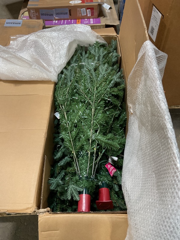 Photo 1 of **LIGHTS NON-FUNCTIONAL*** National Tree Company 12 ft Pre-Lit Tiffany Fir Slim Artificial Christmas Tree, 1,200 Clear Lights, 4,828 Tips, Includes Stand, Green