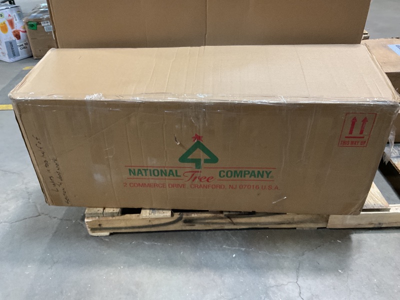 Photo 1 of **LIGHTS NON-FUNCTIONAL*** National Tree Company 12 ft Pre-Lit Tiffany Fir Slim Artificial Christmas Tree, 1,200 Clear Lights, 4,828 Tips, Includes Stand, Green