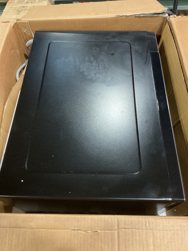 Photo 1 of *** FOR PARTS ONLY/ HAS DAMGES **** GE Countertop Microwave Oven, 1,150-watt Capacity, 1.6 Cubic Ft., 8 Auto Setting Cooking Settings, Child-Lock Technology, Kitchen Essentials for the Countertop, Dorm Room or Apartment, Black Stainless