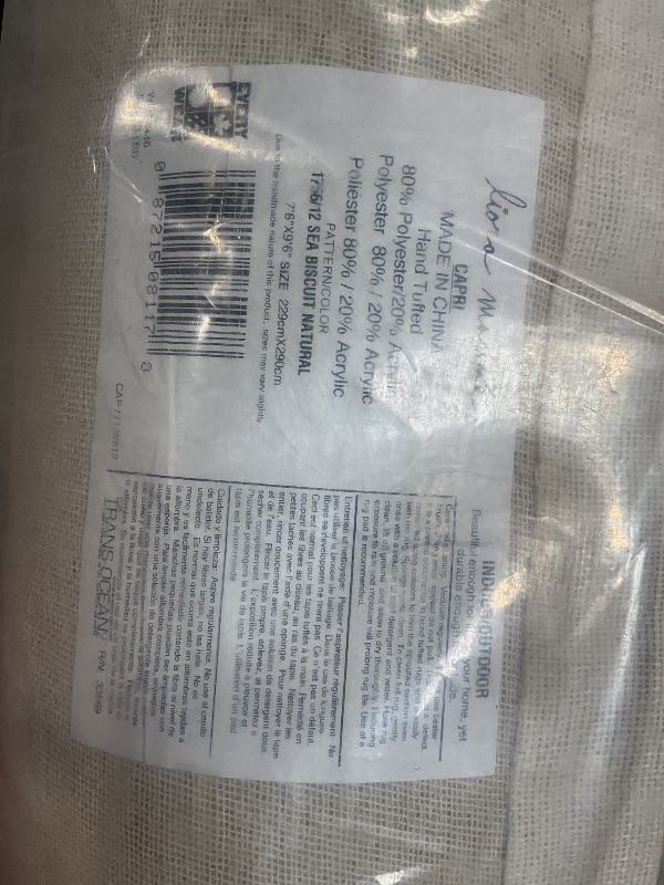 Photo 1 of Liora Manne Capri Indoor/Outdoor Handmade Synthetic Blend Durable Area Rug - Transitional Graphic Coastal Beach Decorative (Sea Biscuit Natural) (7'6" x 9'6")