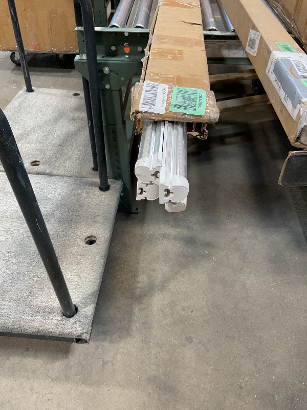 Photo 1 of ****FOR PARTS ONLY / NON-FUNCTIONAL & HAS DAMAGES*** Barrina 8FT LED Shop Lights, 72W 10000LM 5000K, Daylight White, V Shape, Clear Cover, Hight Output, Linkable, T8 LED Tube Lights for Garage 8 Foot with Plug, 4 Packs