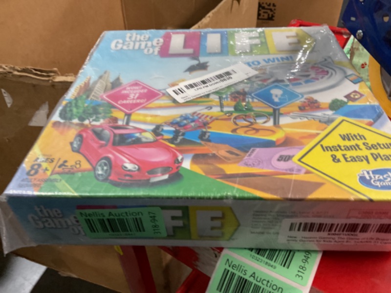 Photo 1 of Hasbro Gaming The Game of Life Board Game, Family Games for Kids Ages 8+, Includes 31 Careers, Family Board Games for 2-4 Players, Family Gifts (Amazon Exclusive)