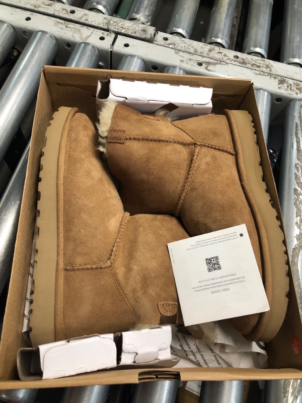 Photo 5 of **1 BOOT IS DAMAGED, MISSING A CHUNK, SEE PHOTO**
UGG Women's Mini Bailey Bow Ii Boot, Chestnut, - SIZE 7 WOMENS