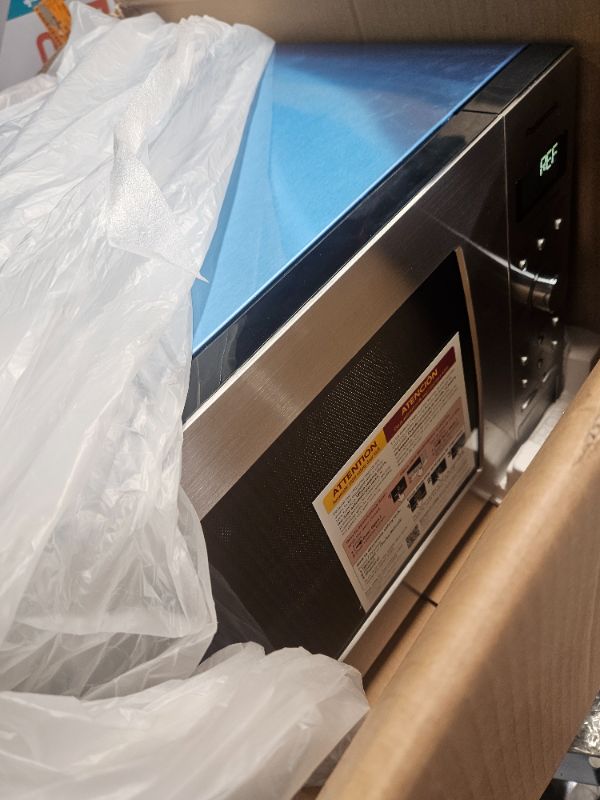 Photo 1 of ***MINOR DAMAGE***

Panasonic Oven with Cyclonic Wave Inverter Technology