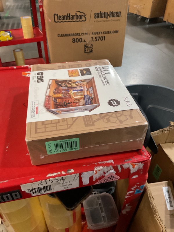 Photo 1 of Rolife DIY Miniature House Kit Magic House, Tiny House Kit for Adult to Build, Mini House Making Kit with Furniture, Halloween/Christmas Decorations/Gifts for Family and Friends(Kiki's Magic Emporium)