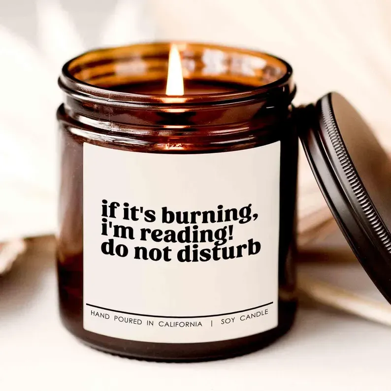 Photo 1 of ***STOCK PHOTO REFERENCE ONLY***If it's burning i'm reading do not disturb candle, candle for friend, book lover gift, smut reader candles, reading gifts 7oz lavender scented