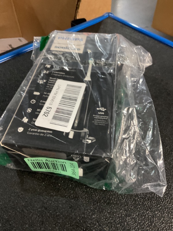 Photo 1 of Philips Sonicare 4100 Rechargeable Electric Toothbrush, with Pressure Sensor, 2 Intensity Settings, SmarTimer and QuadPacer, 14-Day Battery Life, Black, Model HX3681/24