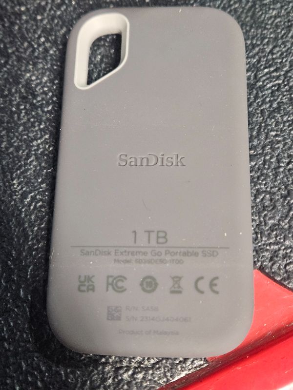 Photo 1 of **ITEM IS IN WRONG PACKAGING **
SanDisk 1TB Extreme Go SSD