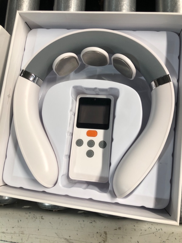 Photo 3 of ***(MISSING CHARGER)*** 
Auxoliev Neck Massager for Pain Relief Deep Tissue, FSA HSA Eligible Items, Electric Pulse Neck Massager with Heat, 9 Modes 50 Levels Cordless Cervical Neck Massage for Women Men