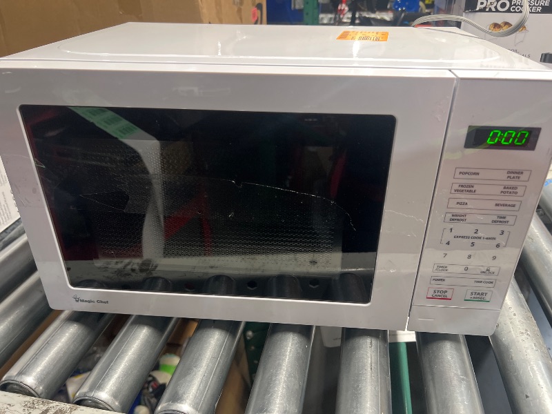 Photo 1 of Magic Chef MC77MW Countertop Microwave Oven, Small Microwave for Compact Spaces, 700 Watts, 0.7 Cubic Feet, White