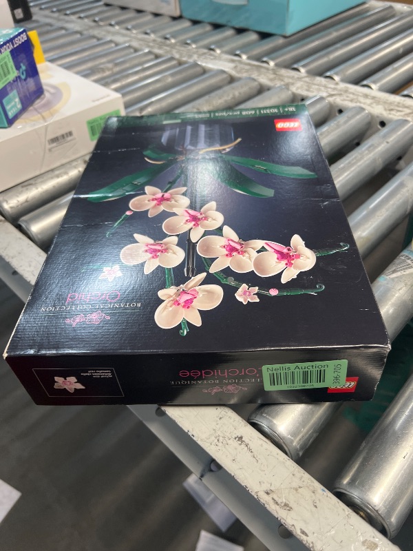 Photo 2 of ***FACTORY SEALED***
LEGO Botanicals Orchid - Artificial, Fake Indoor Flowers Building Set for Home, Kitchen, Desk Decoration, Adults Ages 18+ - Gift for Valentines Day for Her and Him - 10311