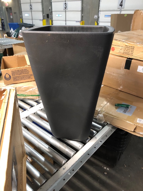 Photo 3 of ***DAMAGED - DENTED - SEE PICTURES***
Step2 Bridgeview Tall Square Planter Box, Onyx Black - Large Planter for Outdoor/Indoor Use - Maintenance Free Design - Ideal Patio and Front Porch Planter – Measures 16.84" x 16.84" x 26", 1-Pack