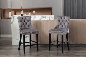 Photo 1 of * MISSING HARDWARE* ROCKINGRUN Bar Stools Set of 2,Velvet Bar Chairs Set of 2 with Tufted Back and Wooden Legs,27.2" Upholstered Counter Height Bar Stools Chrome Nailhead Trim for for Kitchen,Cafe,Bar,Dining Room,Grey