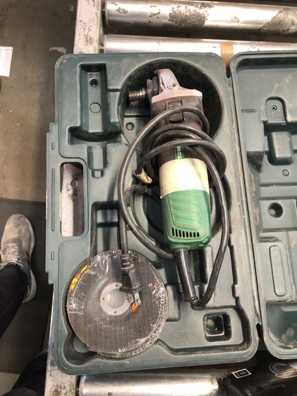 Photo 2 of *** heavly used but tested and functional****Metabo HPT 4-1/2-Inch Angle Grinder, Includes 5 Grinding Wheels & Hard Case, 6.2-Amp Motor, Compact & Lightweight, G12SR4