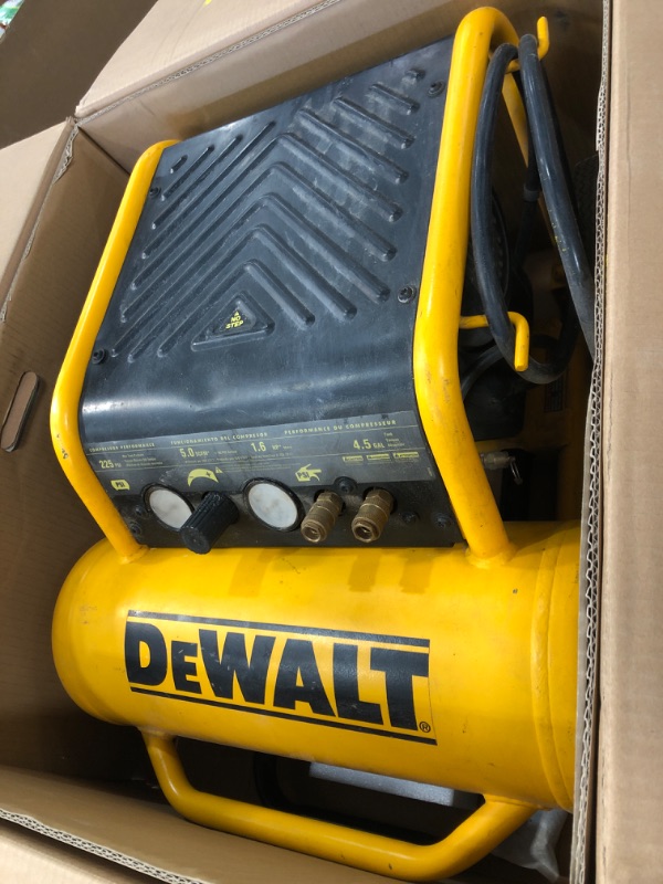 Photo 2 of **SEE NOTES** DEWALT Air Compressor, 225-PSI Max, Hand Carry with Wheels, 4-1/2 Gallon (D55146)