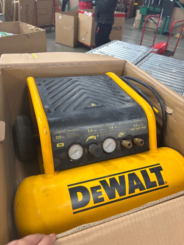 Photo 3 of **SEE NOTES** DEWALT Air Compressor, 225-PSI Max, Hand Carry with Wheels, 4-1/2 Gallon (D55146)