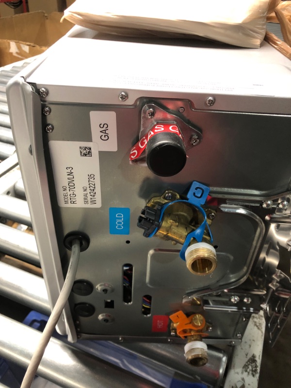 Photo 2 of **DAMAGED, DENTED ON FRONT**
Rheem RTG-70DVLN-3 High Efficiency Non-Condensing Indoor Tankless Natural Gas Water Heater, 7.0 GPM