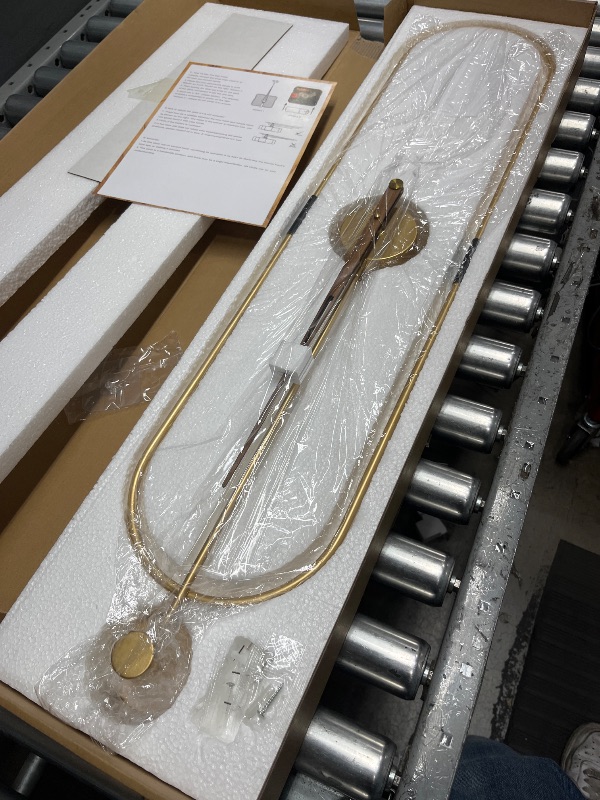 Photo 1 of DRELIFAM Modern Oval Wall Clock Large Wall Clock with Walnut Pointers Silent Metal Wall Clock for Living Room Home Decor Bedroom Kitchen Office (Oval Gold, Large)