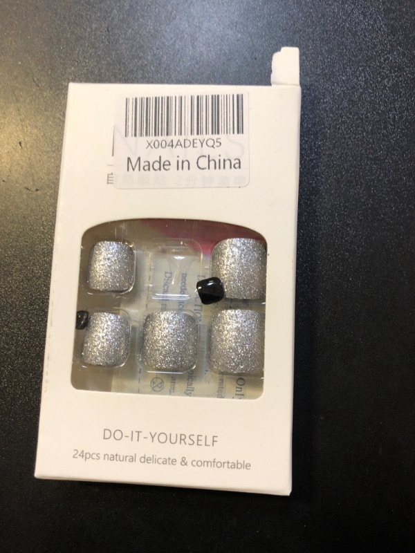Photo 1 of Rilafuvu Press on Toenails Black Toenail Press ons Glossy Toe Press on Nails Fake Toenails With Sliver Glitter Designs Press on Toe Nails Toe Acrylic Nails Press on Toe Nails Short for Women and Girls