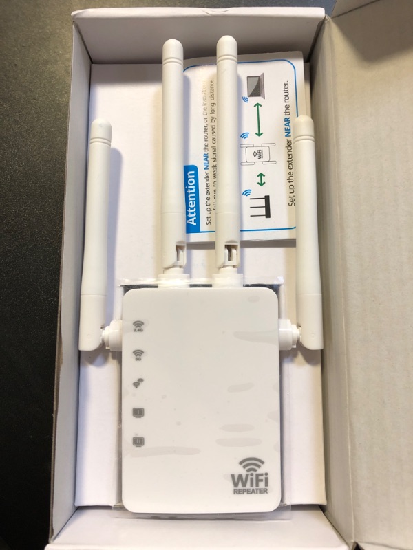 Photo 1 of 1200Mbps Dual Band 2.4&5GHz WiFi Extender, WiFi Extender Signal Booster for Home Cover up to 12880 sq. ft & 105 Devices, 1-Tap Setup, Supports Ethernet Port