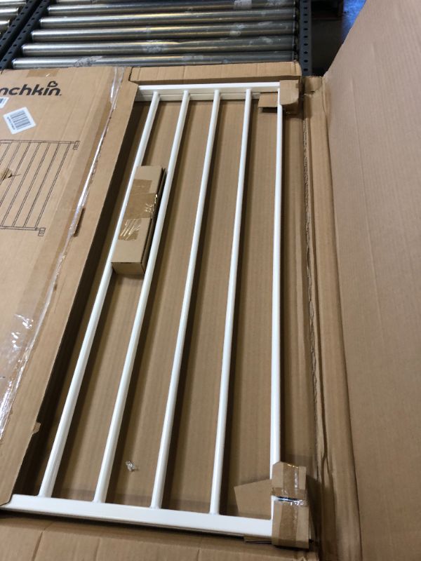 Photo 1 of Munchkin® Extending XL™ Tall and Wide Baby Gate, Hardware Mounted Safety Gate for Stairs, Hallways and Doors, Extends 33" - 56" Wide, Metal, White