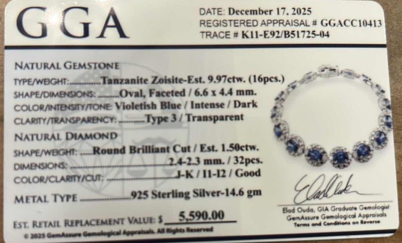 Photo 1 of STERLING SILVER W NATURAL TANZANITE ZOISITE (16 PCS) APPROX 9.97 CTW OVAL FACETED AND NATURAL DIAMOND 1.50 CTW BRACELET GGA CERTIFIED -BR009106