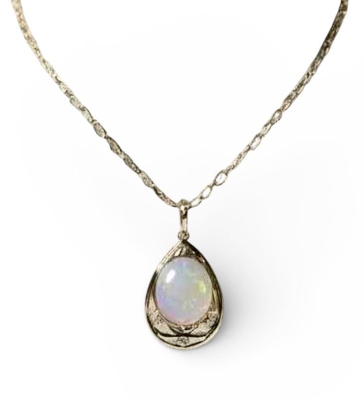 Photo 1 of STERLING SILVER W 18K GOLD OVERLAY W NATURAL OPAL (PLAY OF COLOR) APPROX 11.08 CTW OVAL CABOCHON PENDANT AND NATURAL DIAMOND 0.20 CTW GGA CERTIFIED -NK017293
