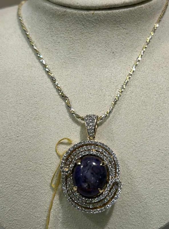 Photo 1 of 925 STERLING SILVER W YELLOW GOLD OVERLAY RUBY & WHITE SAPPHIRE PENDANT W 17” CHAIN ONE CABOCHON RUBY APPROX 20.00 CTS AND 132 ROUND SAPPHIRES APPROX 2.47 CTW TOTAL GEM WEIGHT APPROX 22.47 CTS WESTFIELD JEWELRY APPRAISERS -NK017298