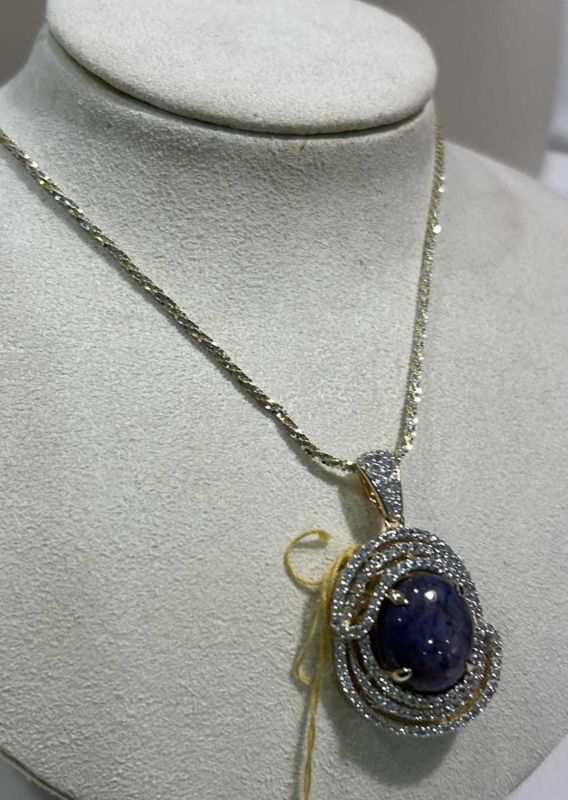 Photo 1 of 925 STERLING SILVER W YELLOW GOLD OVERLAY RUBY & WHITE SAPPHIRE PENDANT W 17” CHAIN ONE CABOCHON RUBY APPROX 20.00 CTS AND 132 ROUND SAPPHIRES APPROX 2.47 CTW TOTAL GEM WEIGHT APPROX 22.47 CTS WESTFIELD JEWELRY APPRAISERS -NK017298