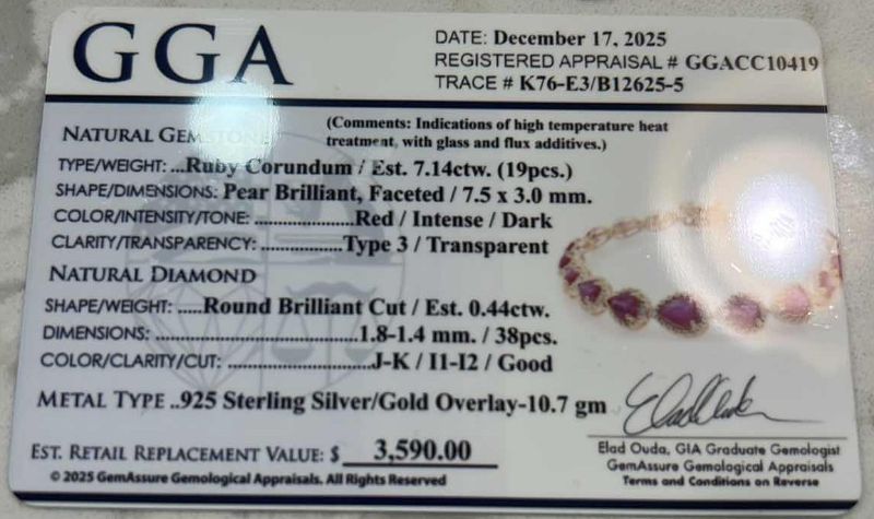Photo 1 of 925 STERLING SILVER W GOLD OVERLAY RUBY CORUNDUM & DIAMOND BRACELET
19 RUBIES APPROX 7.14 CTW AND DIAMONDS APPROX 0.44 CTW
GGA CERTIFIED -BR009105