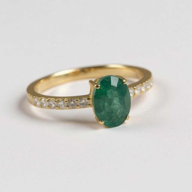 Photo 1 of 925 STERLING SILVER W 18K GOLD OVERLAY EMERALD BERYL & DIAMOND RING
EMERALD APPROX 0.73 CTW AND DIAMONDS APPROX 0.20 CTW
GGA CERTIFIED (EST SIZE 7.5) - RN040651