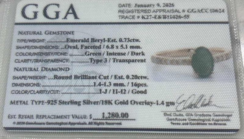 Photo 1 of 925 STERLING SILVER W 18K GOLD OVERLAY EMERALD BERYL & DIAMOND RING
EMERALD APPROX 0.73 CTW AND DIAMONDS APPROX 0.20 CTW
GGA CERTIFIED (EST SIZE 7.5) - RN040651