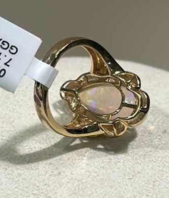 Photo 1 of 925 STERLING SILVER W 18K GOLD OVERLAY OPAL & DIAMOND RING
OPAL APPROX 7.10 CTW AND DIAMONDS APPROX 0.19 CTW
GGA CERTIFIED (EST SIZE 8)-RN040650