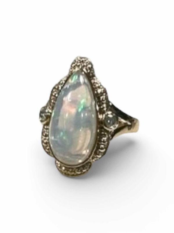 Photo 1 of 925 STERLING SILVER W 18K GOLD OVERLAY OPAL & DIAMOND RING
OPAL APPROX 7.10 CTW AND DIAMONDS APPROX 0.19 CTW
GGA CERTIFIED (EST SIZE 8)-RN040650