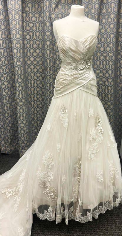 Photo 1 of BRIDAL GOWN “MAGGIE SOTTERO COUTURE” ALABASTER IVORY LACE WITH PEWTER ACCENT SOFT SHIMMER SATIN FLOWERS FEATURING SWAROVSKI CRYSTALS SIZE 2,