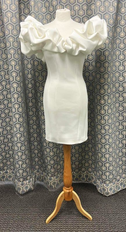 Photo 1 of BRIDAL GOWN “JOVANI” SHORT WHITE WEDDING DRESS WITH FITTED SILHOUETTE AND DRAMATIC RUFFLED SLEEVES, SIZE 10 