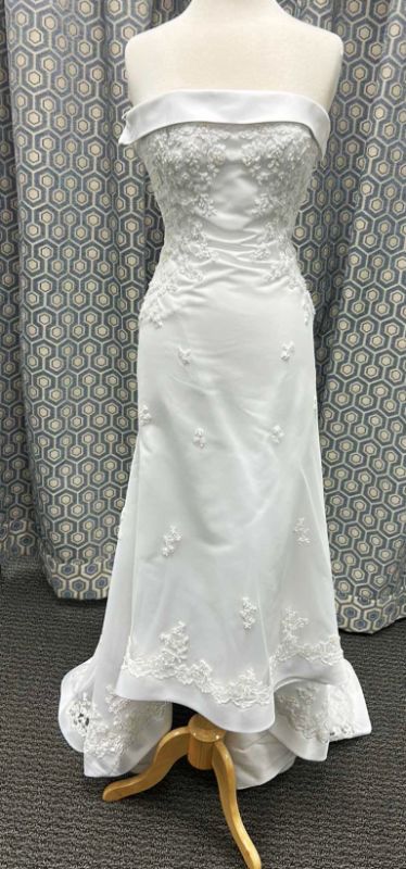 Photo 1 of BRIDAL GOWN, ONE-PIECE, SOFT ORGANZA OVER SATIN GOWN WITH FLOWER EMBELLISHMENTS AND A MEDIUM TRAIN SIZE 8,