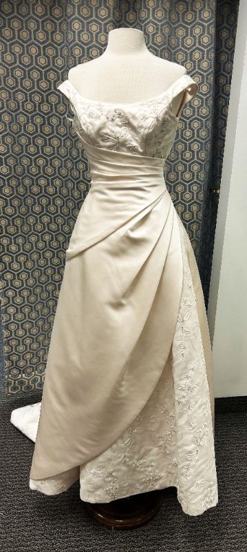 Photo 1 of BRIDAL GOWN, IVORY SATIN, OFF THE SHOULDER, RUCHED BODICE EMBROIDRED LACE DETAILING, A-LINE, CORSET BACK, SIZE 6