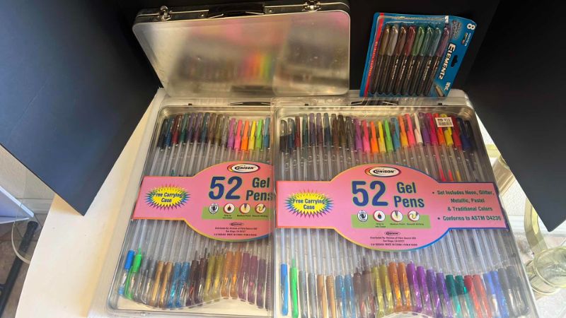 Photo 1 of 4 SETS OF COLORED GEL PENS WITH CARRYING CASE AND MARKERS