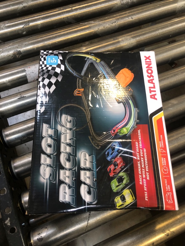 Photo 1 of Slot Car Race Tracks Sets - Electric Racing Car Track with Slot Cars & Accessories - Dual Lane Race Track for Boys & Girls Age 5 for Kids 4-8 Easy Setup & Fast Four Cars