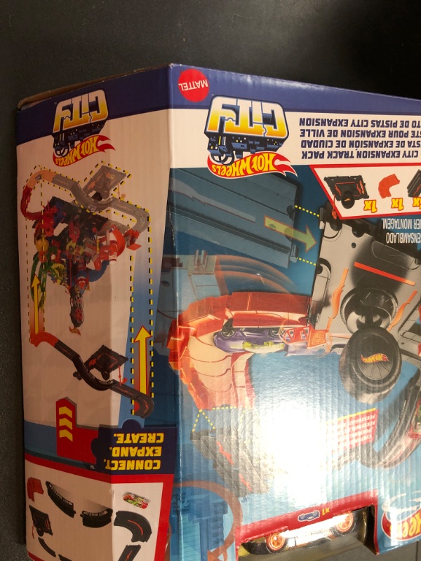 Photo 1 of Hot Wheels Toy Car Track Set Pack, 10 Track-Building Parts with City Square, Bridge & 1:64 Scale Vehicle, Connects to Other Tracks