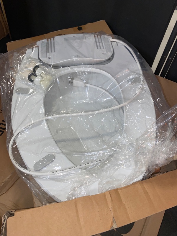 Photo 1 of Brondell L60-EW LumaWarm Heated Toilet Seat with Night Light Three Temperature Settings, Gentle Close Lid, Easy Installation, Built-in Controls, Elongated, White