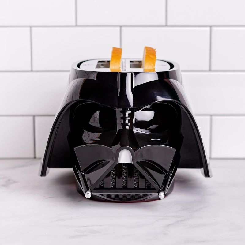 Photo 1 of Uncanny Brands Star Wars Darth Vader Halo Toaster - Lights-Up and Makes Lightsaber Sounds
