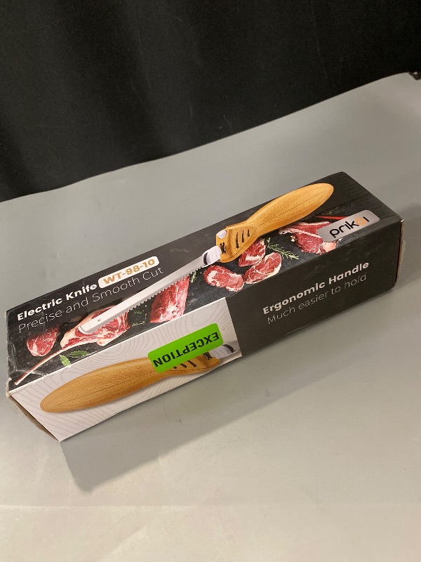 Photo 1 of Electric Knife - Easy-Slice Serrated Edge Blades Carving Set for Meat, Bread, Turkey, Ribs, Fillet, DIY, Ergonomic Handle + 2 Blades for Raw & Cooked Food(Faux Wood)
