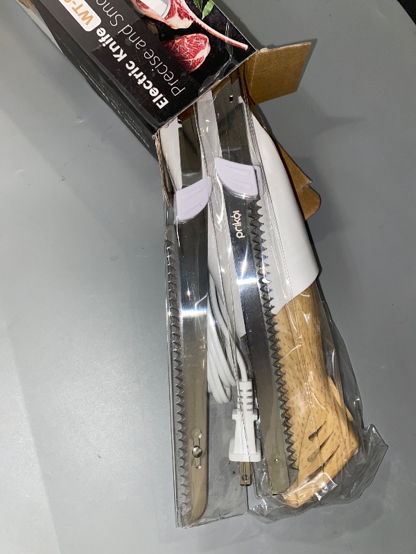 Photo 1 of Electric Knife - Easy-Slice Serrated Edge Blades Carving Set for Meat, Bread, Turkey, Ribs, Fillet, DIY, Ergonomic Handle + 2 Blades for Raw & Cooked Food(Faux Wood)
