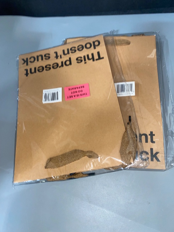 Photo 1 of 2- This Present Doesn't Suck Funny Gift Bags - 2 Piece Set, Inappropriate Snarky Wrapping for Birthdays, Perfect for Friends, Coworkers, Office Parties, White Elephant, and Quirky Adult Humor
